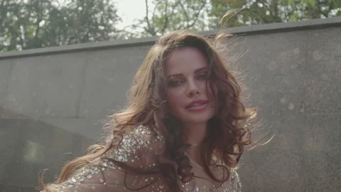 Close-up portrait of nice-looking beautiful young woman looking into camera Stock Footage 161567067