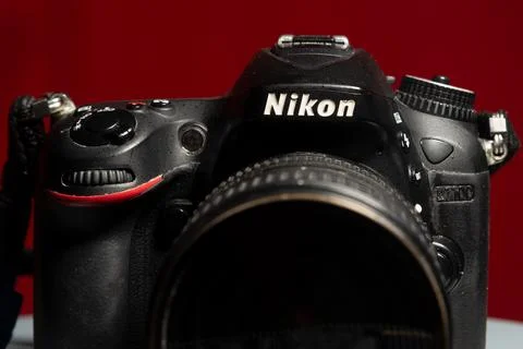Close-up portrait of a professional DSLR camera by Nikon D7100, with Nikkor.. Stock Photos
