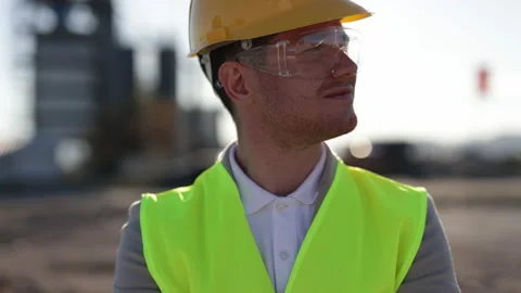 Close Up Portrait of Professional Heavy Industry Engineer, Worker Wearing Safety Vídeos de archivo 230977873