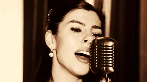 Close-up portrait of the singer, retro, black and white. Stock Footage 44432022