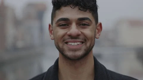 Close up portrait of the smiled multi ethnic man standing downtown. People face Stock Footage 224646049