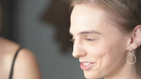 Close up portrait of smiley and talking model during the make up face. Stock Footage 121508389