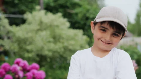 Close-up portrait of a smiling boy in a cap. Stock Footage 279241114