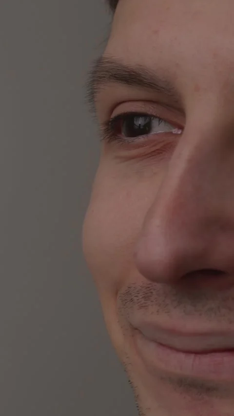Close up portrait of a smiling young man looking away with hope Stock Footage 335082317