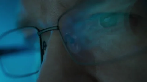 Close up portrait of software engineer working on computer. Line of hack code Stock Footage 224530124