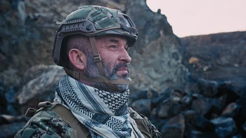 Close-up portrait of the special force soldier in a mountains.Military and Stock Footage 146588577
