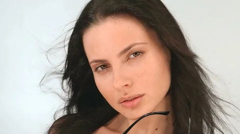 Close-up portrait in the studio, the wind blows on the hair Stock Footage 63295799