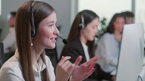 Close Up Portrait of a Technical Customer Support Specialist Talking on a Stock Footage 168684483