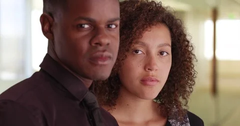Close-up portrait of two black millennial professionals in a business office Video stock 69894551