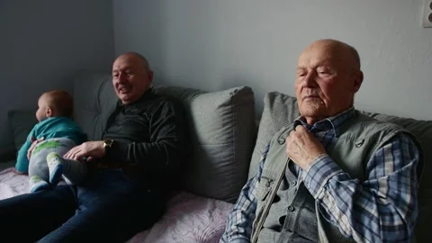 Close up portrait of two elderly man. Little grandson embracing grandfather. Stock Footage 146403797