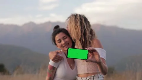 Close up portrait of two happy smiling beautiful asian female tourist standing Stock Footage 206887089