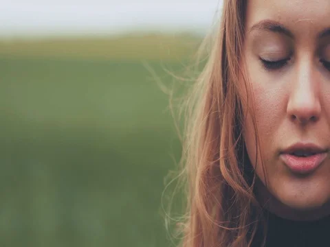 Close Up Portrait of Woman Standing on the Wind. SLOW MOTION 4K DCi. Stock Footage