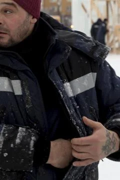 Close-up portrait of a worker at a construction site 写真素材