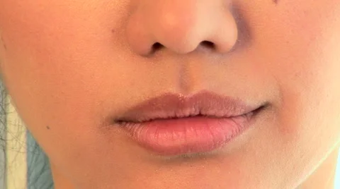 Close up portrait of young Asian woman smiling mouth and eye Stock Footage
