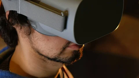 Close-up portrait of young bearded man in virtual reality glasses. Stock Footage 101405573
