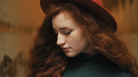 Close up portrait of young beautiful redhead woman with natural freckles, long Stock Footage 106514591