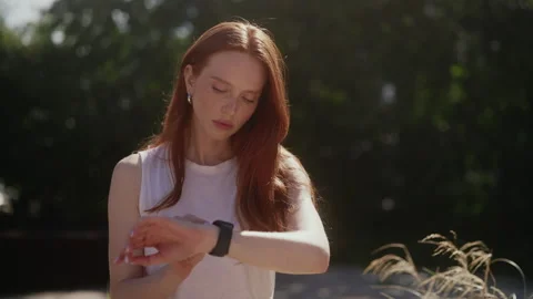 Close-up portrait of young beautiful redhead sporty woman with freckles setting Video stock 343414846