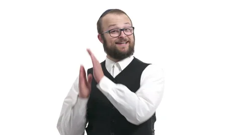 Close-up portrait of a young charming man applauding, smiling, demonstrating Stock Footage 130184056