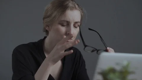 Close up portrait of a young pretty hispanic woman having headache after Stock Footage 129267183