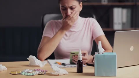 Close up portrait of the young upset sick woman sitting in the office. Ill girl Stock-Footage 164187077