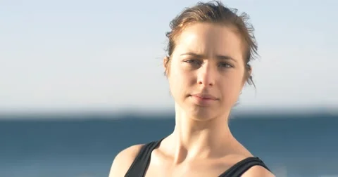 Close-up portrait of a young womans face looking confident Stock Footage 53890559