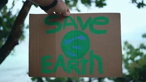 Close-up poster with the words "Save the Earth" Stock Footage 149860497