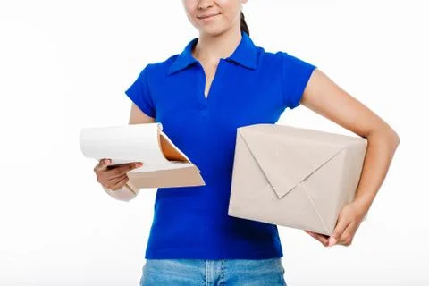 Close up of the postman looking at the parcel shipment details. Stock Photos