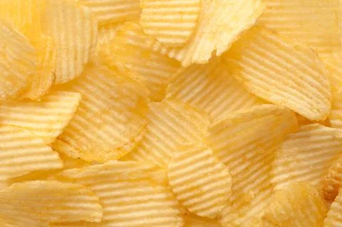 Close up potato chips background Stock Photos