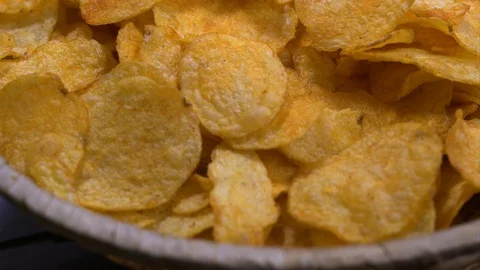 Close-up of a potato chips on rotating tray Stock-Footage 88001616