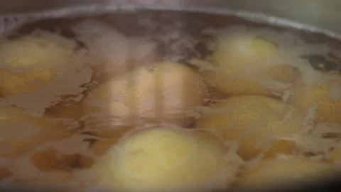 Close Up of Potatoes Boiling in Hot Water in a Stainless Steel Cooking Pot 스톡 동영상 339656545