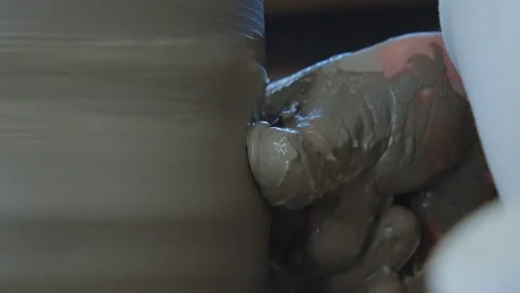 Close Up Potter Finger Shaping Clay On Wheel Slow Motion Stock Footage 328305552