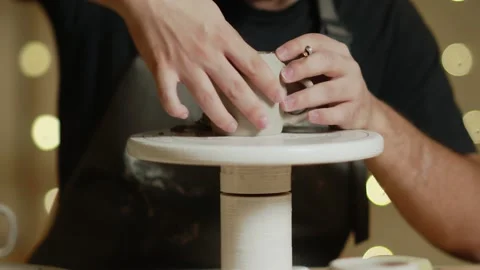 Close up of potter making ceramic clay cup in potter studio Video stock 143617055