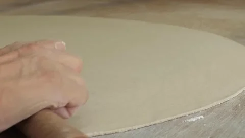 Close-up of Potter Rolling a Large Clay Slab for Ceramic Hand-Building Stockbeeldmateriaal 333522902
