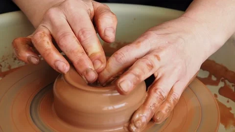 Close-up of a potter's hands working Stock Footage 235758972