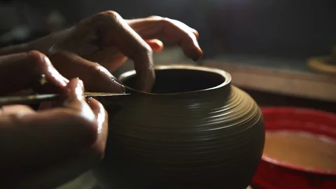 Close up of pottery shop making tea pot Stock Footage 116555969