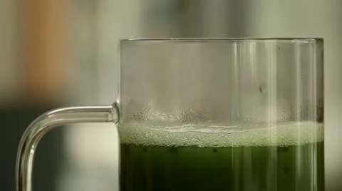 Close up of pouring and stirring matcha Stock Footage 64890905
