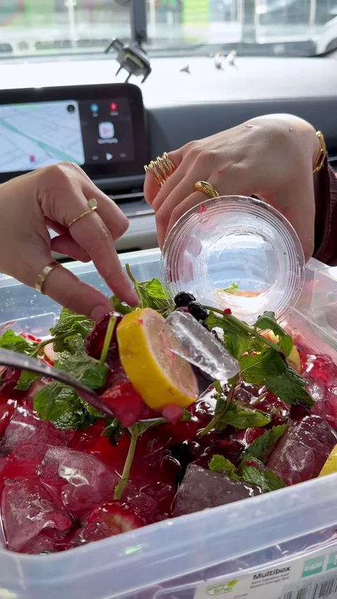 Close Up Pouring Berry Drink Inside Car Stockbeeldmateriaal 337451089