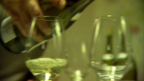 Close up of pouring bottle of Chablis wine Stock Footage 130350581
