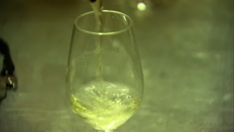 Close up of pouring bottle of Chablis wine Stock Footage 130350947