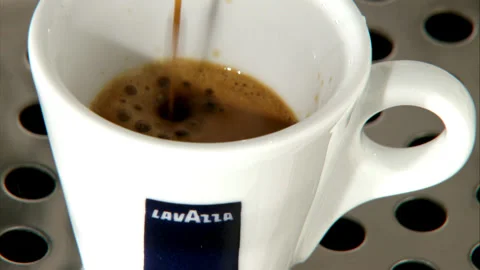 Close up of Pouring Coffee Into Cup Stock Footage 130283432
