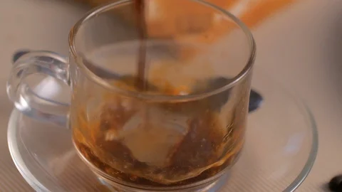 Close-up pouring coffee Stock Footage 128299051