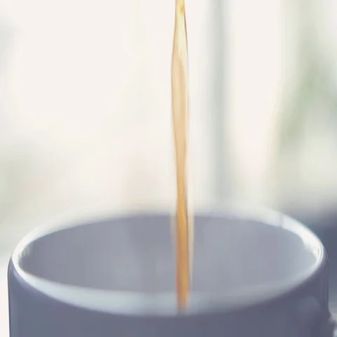 Close up of pouring coffee into white cup Stock Footage 69283751