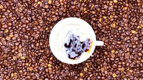 Close-up of pouring coffee into a white cup Stock Footage 247394590