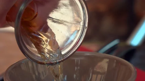 Close Up - Pouring drinks in glass during Summer Stock Footage 68602433