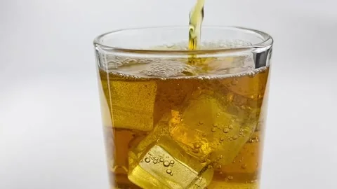 Close up pouring lemon tea with ice, soft drinks isolated white grey background Stock Footage 204113349