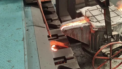 Close-up of the pouring process in an intelligent foundry workshop. Stock Footage 303794450