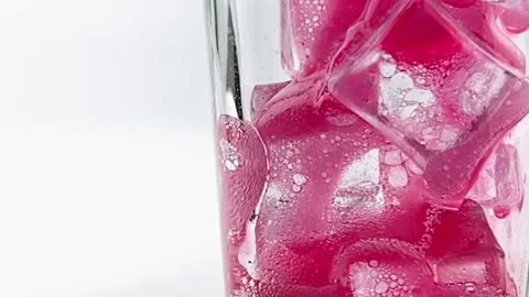 Close up pouring soft Drinks, red soda Isolated on White  clipping path Stock Footage 204114428
