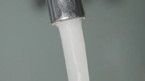 Close up, pouring water in slow mo Stock Footage 138907171