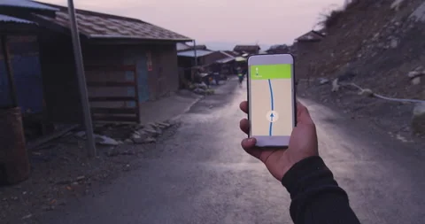 Close up pov of Backpacker tourist using a gps navigator on a smartphone in Myan Stock Footage 201095243