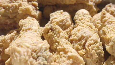 Close up pov fried chicken box opened drum sticks Stock Footage 294441457